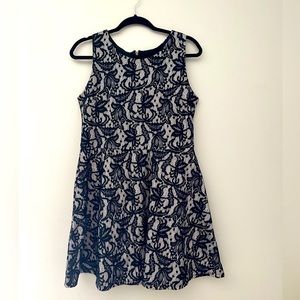 Sleeveless black and cream lace a-line dress